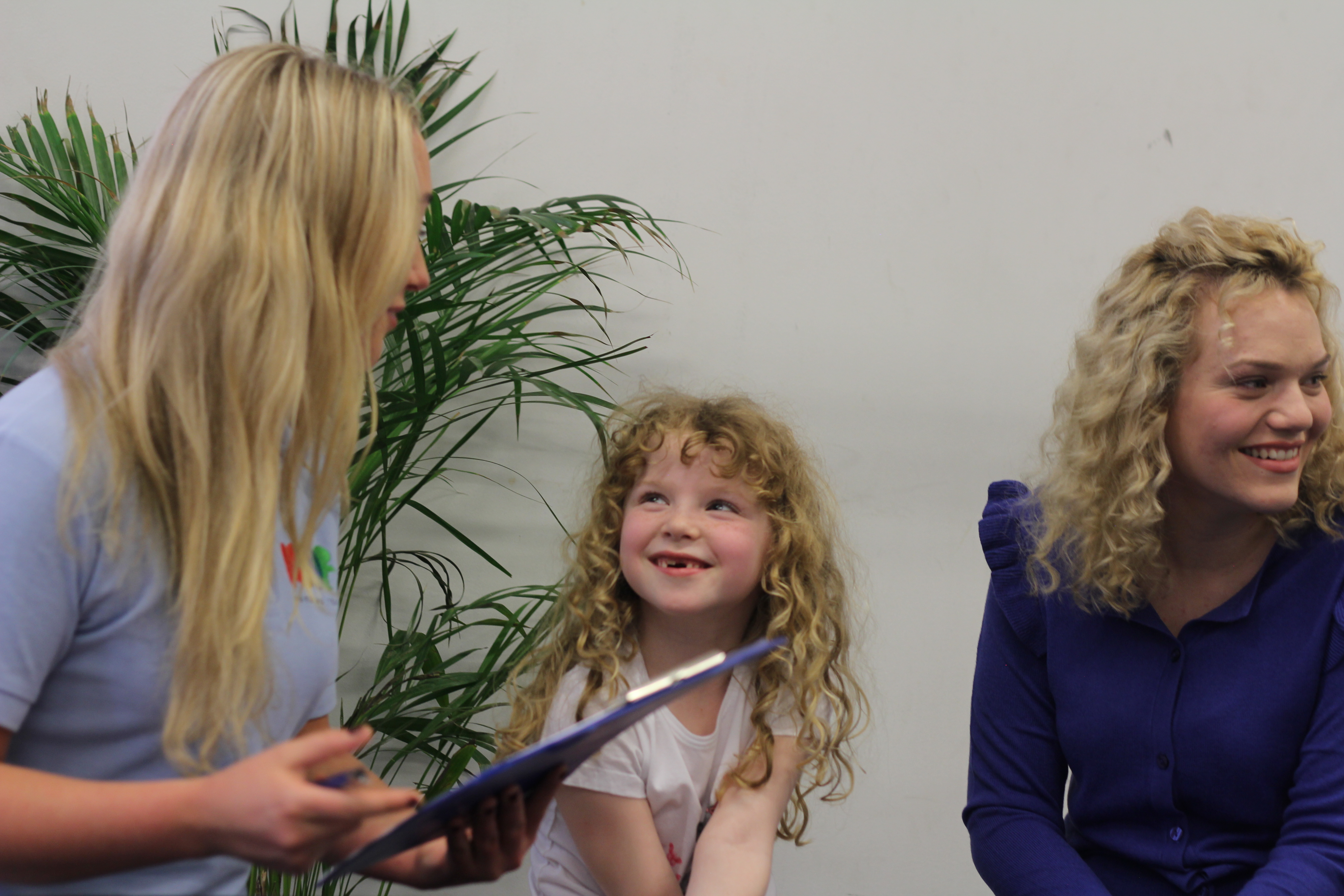 Macie laughing at saffron with sister