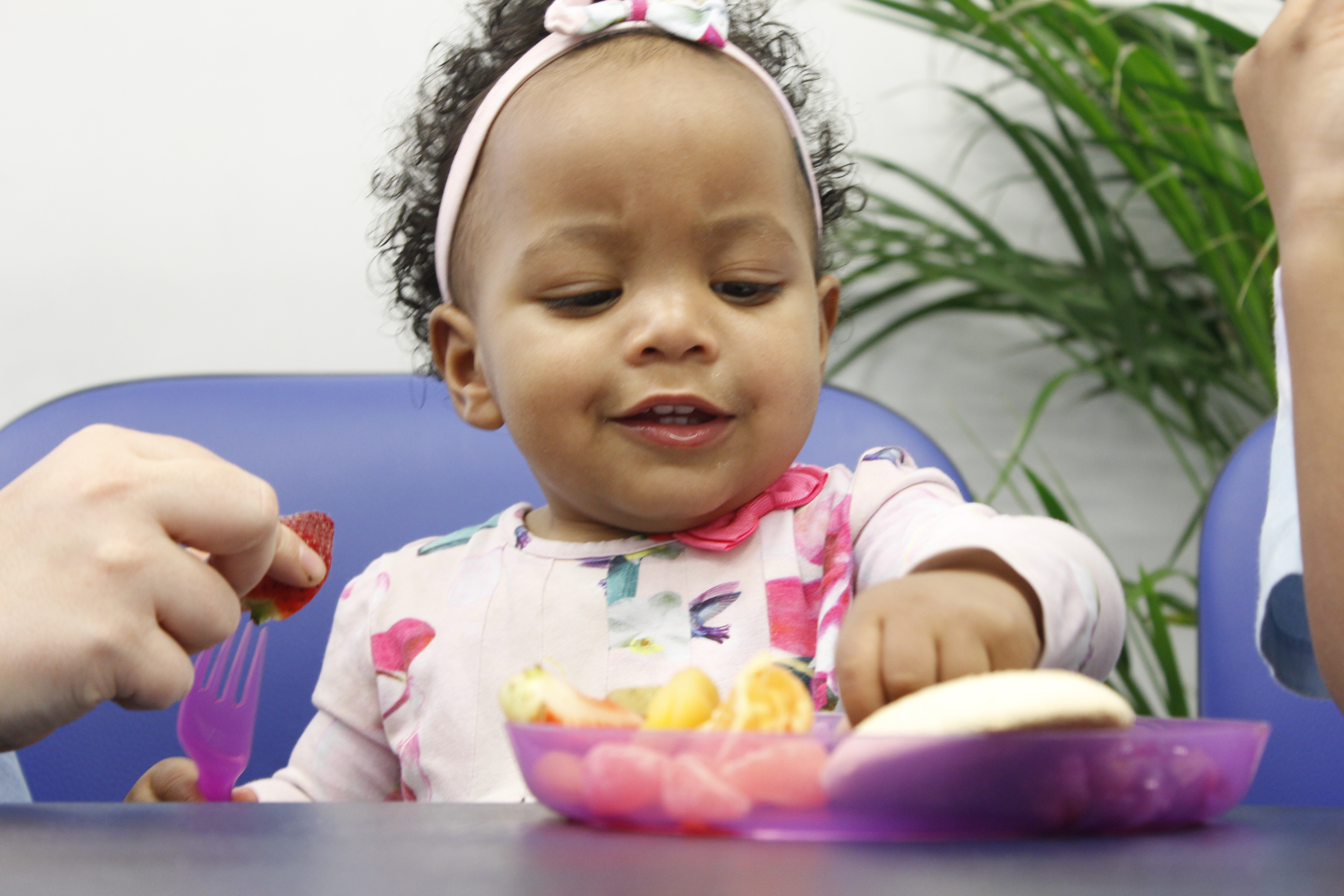 Jada smiling with fork